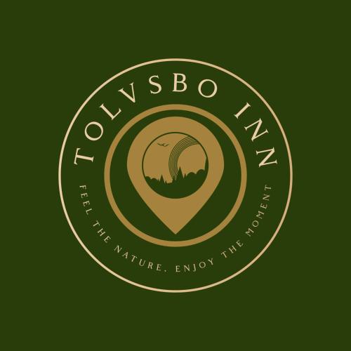 a green and gold logo with a forest in a circle at Cottage Lake view Dalarna - Tolvsbo in Söderbärke