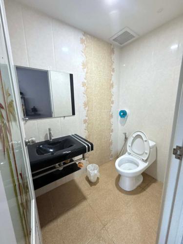 a small bathroom with a toilet and a sink at Cocoloco Pool Villa Ao Nang in Ao Nang 