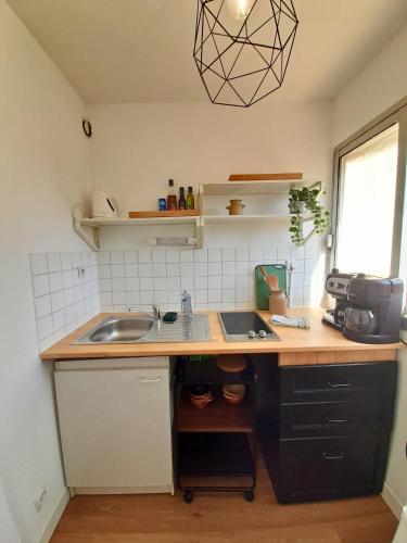 Appartement T1 cosy- terrasse - parking gratuit
