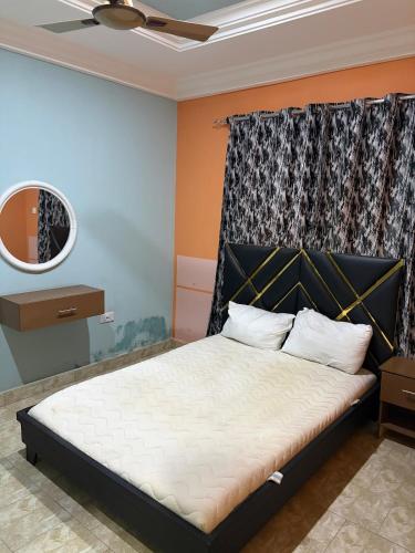 Llit o llits en una habitació de Room 19