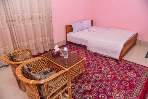 Llit o llits en una habitació de Al Hera Resort