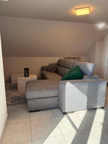 a living room with a couch and a table at Villa Montepaone in Montepaone Lido