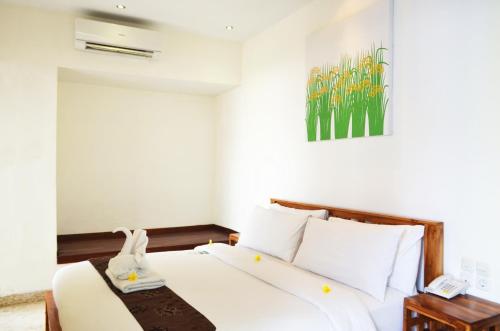 Ένα ή περισσότερα κρεβάτια σε δωμάτιο στο Jas Green Villas and Spa