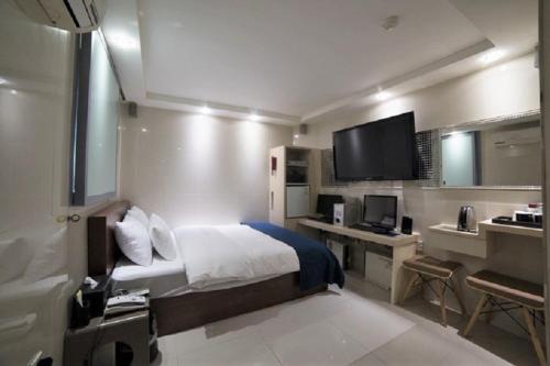 Cuina o zona de cuina de MW Hotel