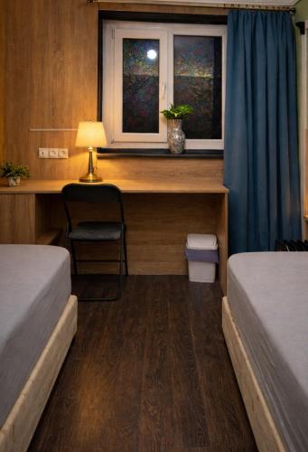 Llit o llits en una habitació de Mouse House