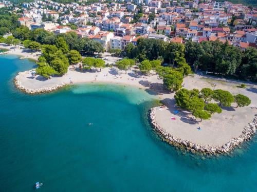 an aerial view of a island in the water at House Tinac in Crikvenica