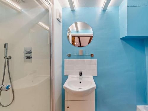 a bathroom with a white toilet and a mirror at 1 Bed in Yelverton oc-93333 in Yelverton