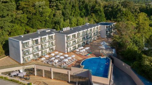 an aerial view of a hotel with a swimming pool at GRIFID Hotel Foresta - All Inclusive & Free GRIFID Beach - Adults Only in Golden Sands