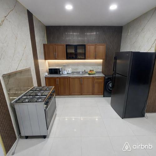 Cuina o zona de cuina de Gardens 2BR Rooftop
