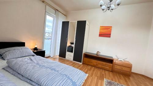 Llit o llits en una habitació de A&K Guest House
