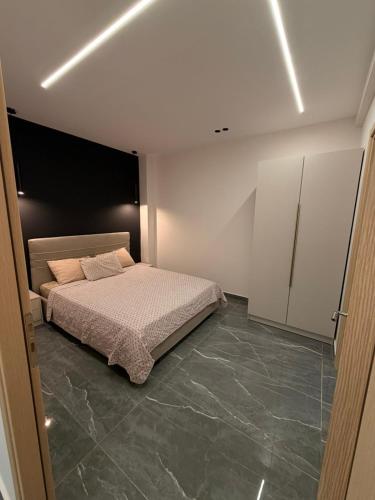 Llit o llits en una habitació de Monda Apartment 3
