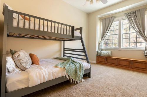 a bedroom with a bunk bed and a bunk bed at Blue Stone Chateau Yosemite Pool Spa Secluded in Abbeyville