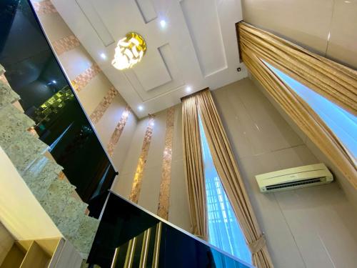 a staircase in a building with a window at Ghomes in Lagos