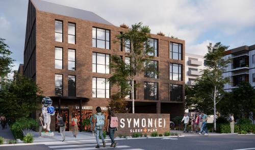 a rendering of a building with people walking in front of it at Symone - Poitiers in Poitiers