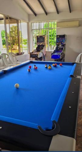 a pool table with balls on it in a room at Finca Las Vegas in Aguazul