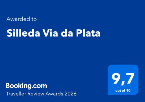 a blue sign with the textived to silicaviavia da da plaza at Silleda Via da Plata in Silleda