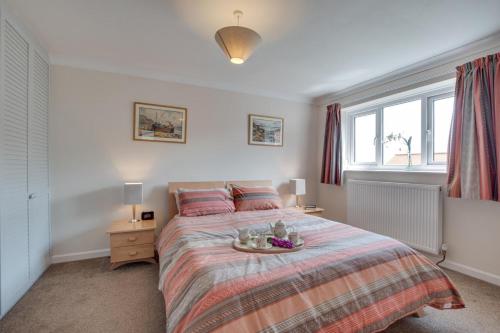 a bedroom with a bed with a bowl on it at 3 Bed in Ravenscar oc-sa397 in Ravenscar