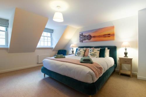 a bedroom with a large bed in a room at 4 Bed in Cromer oc-1942 in Cromer