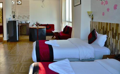Ένα ή περισσότερα κρεβάτια σε δωμάτιο στο Hotel City Inn - Mountain View