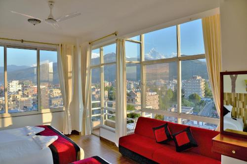 Ένα ή περισσότερα κρεβάτια σε δωμάτιο στο Hotel City Inn - Mountain View