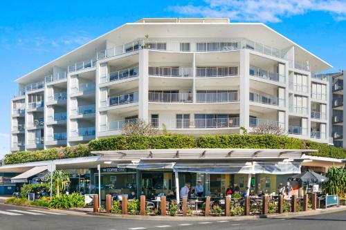 a large building with a lot of windows in front of it at Rovera Apartments in Maroochydore