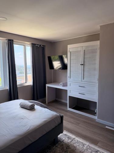 Krevet ili kreveti u jedinici u okviru objekta Buena Vista Apts