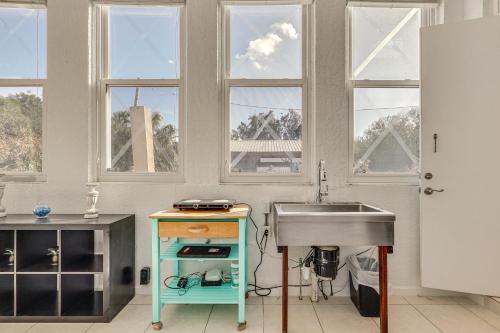 a kitchen with a sink next to a sink at Near Apollo Beach! Bright Apt w/ Essentials in Ruskin