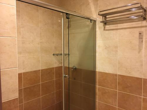 Koupelna v ubytování Lintas Plaza Hotel