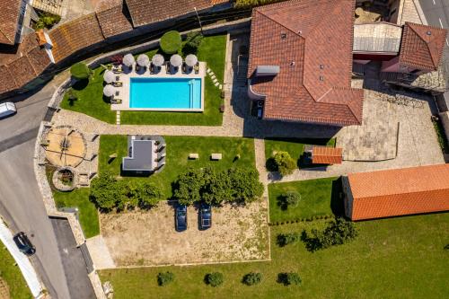 an overhead view of a house with a swimming pool at Casa Da Brêa Viana do Castelo - Villa & Apartment in Viana do Castelo