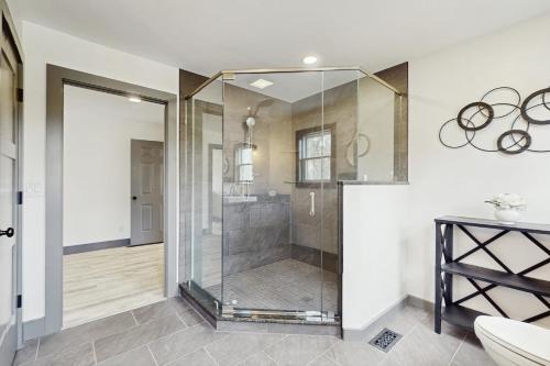 a glass shower in a bathroom with a sink at Outdoor Wonderland! Home 12 Mi to Lake George in Fort Ann