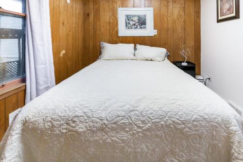 a large bed in a room with a window at Spacious 2BR Apt • Free Parking • Baden in Baden