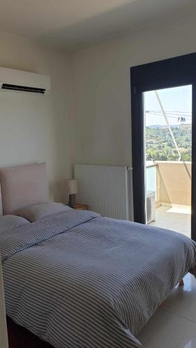 Llit o llits en una habitació de Sea View Apartment