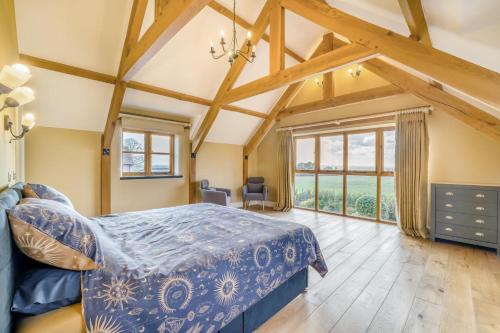 a bedroom with a bed and a large window at 5 Bed in Langport oc-h33495 in Langport