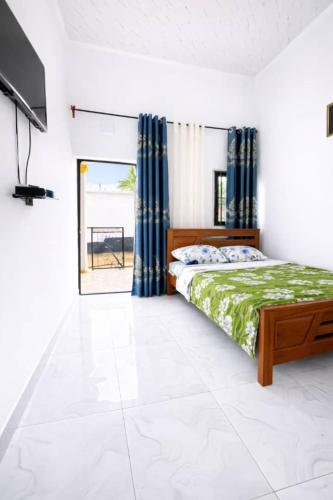 Llit o llits en una habitació de LeGuest Home