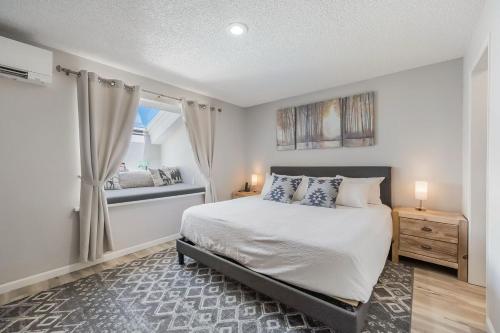 a bedroom with a large bed and a window at Stoneridge Resort in Blanchard