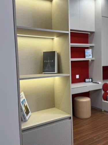a room with a book shelf with a book at H3 ocean park 1 in Gia Lâm Pho