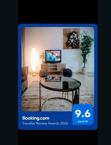 a picture of a living room with a coffee table at 3 bedrooms apartment in Al Rehab city in New cairo