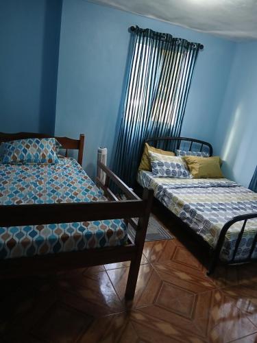 Llit o llits en una habitació de Valley View Inn