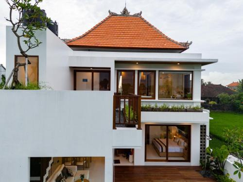 an external view of a house with an orange roof at Mountain Sunshine Private Villa in Darmasaba