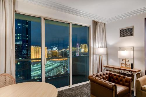 a hotel room with a view of a city at SPHERE VIEW - Signature MGM Resort Lucky Gem Penthouse & Luxury Suites 27817 in Las Vegas
