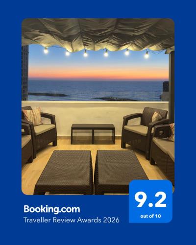 a view of the ocean from a hotel room at Nabeel Homes - Seaview Rooftop - San Stefano in Alexandria