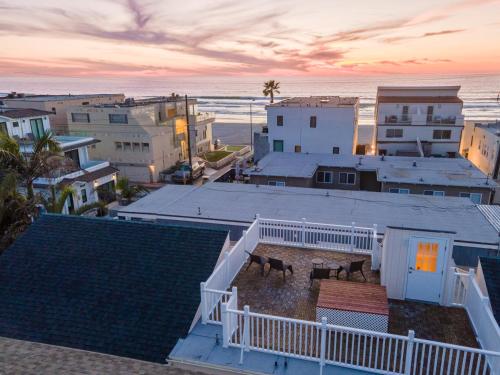a view of a town with horses on the beach at Mission Casa Del Mar in San Diego