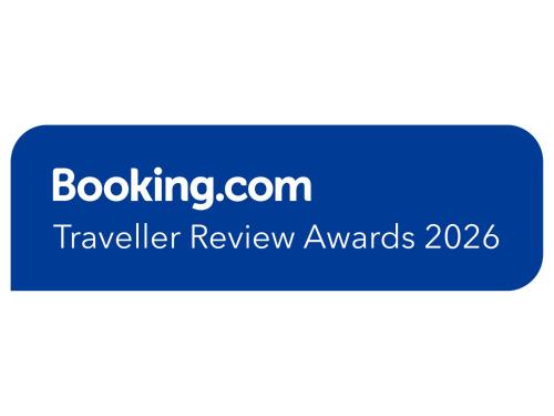 a blue text box with the words travel review awards at アヴェニューコザホテル in Okinawa City