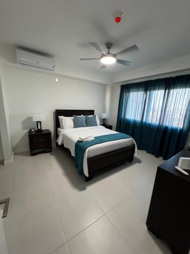 Vuode tai vuoteita majoituspaikassa Serenity suites