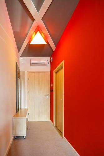 Una cama o camas en una habitación de Net Hotel Pitesti