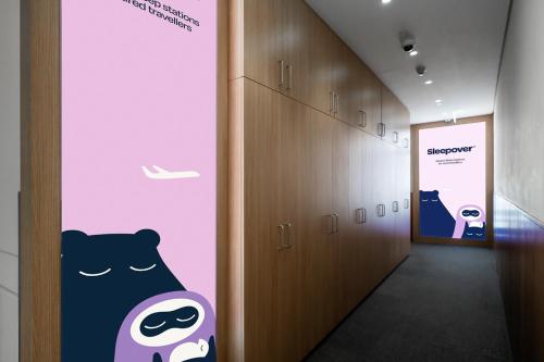 a hallway with a bear painted on the wall at Sleepover Terminal 3, Concourse C - formerly sleep 'n fly in Dubai