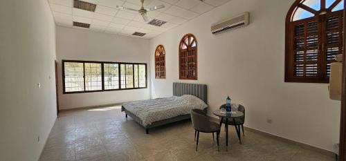 Giường trong phòng chung tại Casa Blanca