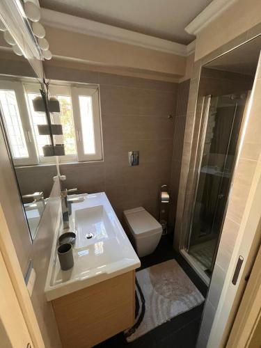Apartment Glyfada Athens at One o One Seven, bright and spacious apartment located on the first floor with no elevator