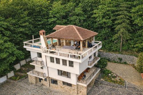an aerial view of a house with a roof at Villa High Point in Pravets
