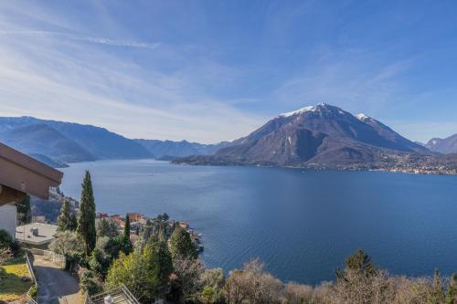 a view of a large body of water with a mountain at Il Nido sul Lago in Perledo